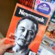Newsweek magazine with Elon Musk on main page in a hand. Newsweek is an American famous and popular weekly magazine