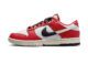 Red and white Nike Dunk Low "Chicago Split" shoe featuring a unique split design, two-tone branding and a clean finish. Made of premium, durable leather, this versatile style statement is perfect for sneakerheads and Chicago Bulls fans.