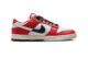 Red and white Nike Dunk Low "Chicago Split" shoe featuring a unique split design, two-tone branding and a clean finish. Made of premium, durable leather, this versatile style statement is perfect for sneakerheads and Chicago Bulls fans.