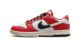 Red and white Nike Dunk Low "Chicago Split" shoe featuring a unique split design, two-tone branding and a clean finish. Made of premium, durable leather, this versatile style statement is perfect for sneakerheads and Chicago Bulls fans.